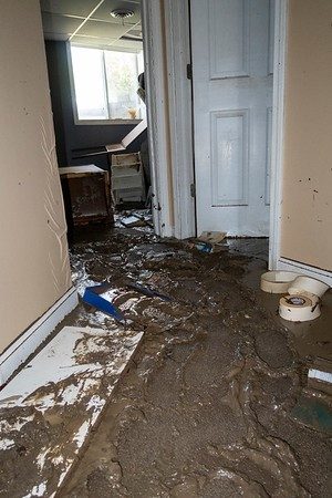 Mud in basement (due to flooding) at the Gaskell Home