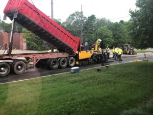 Laying the asphalt for the new parking lot